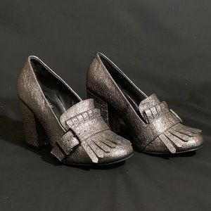 Silver heeled loafer with fringe & buckle detail